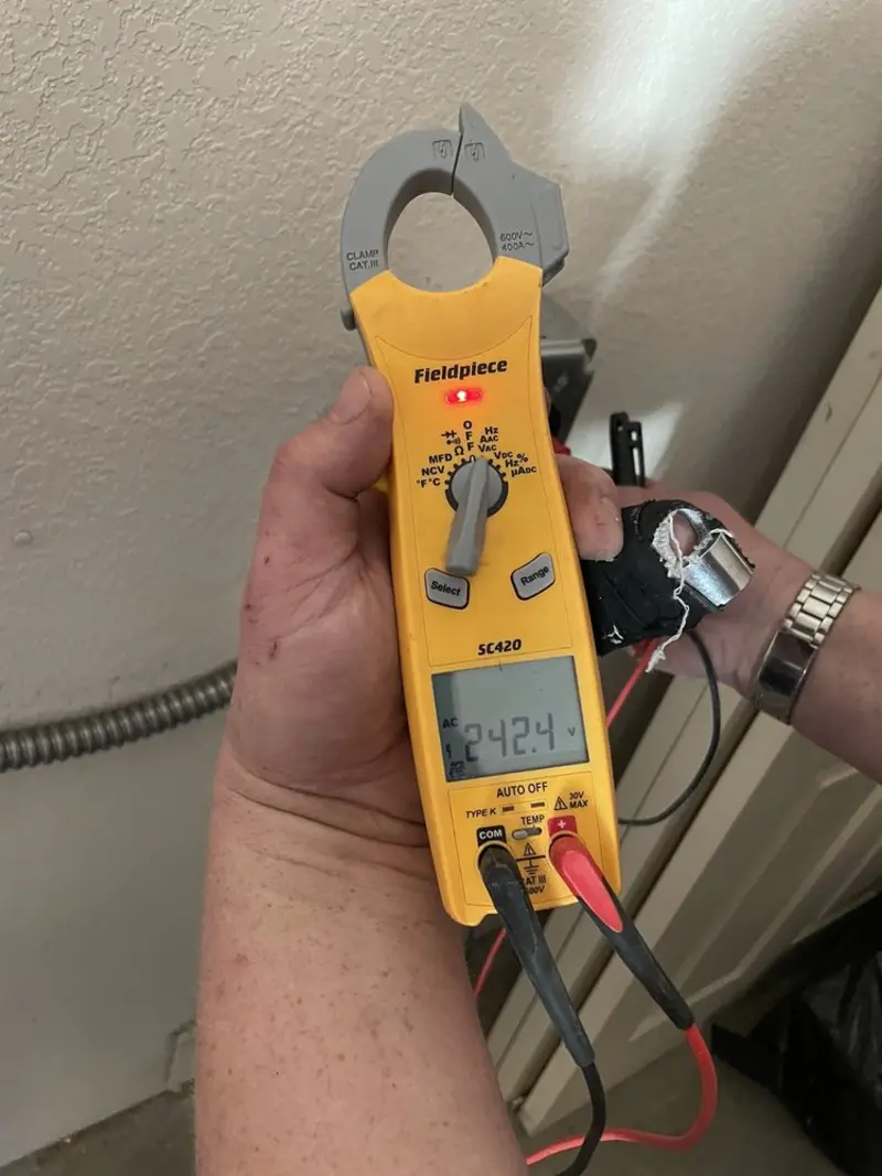 Voltage testing with clamp meter during Generator Installation in De Soto